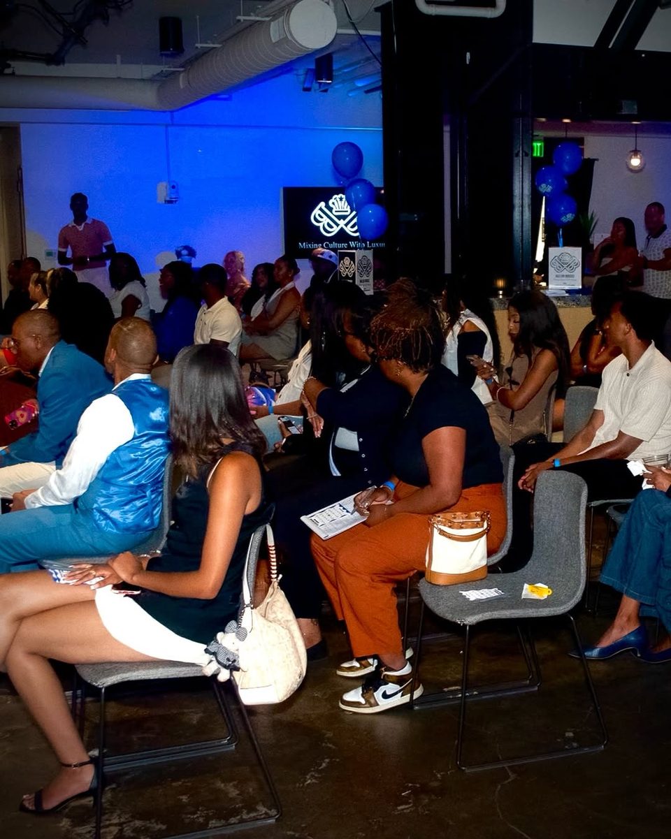 Guests seated for the panel