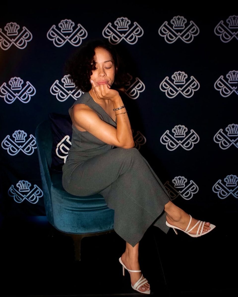 A guest on the step-and-repeat