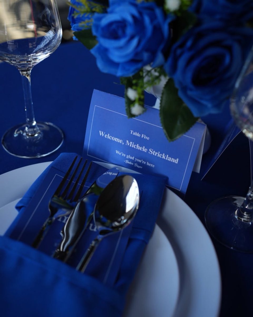 A Baller Bossez place setting with blue roses